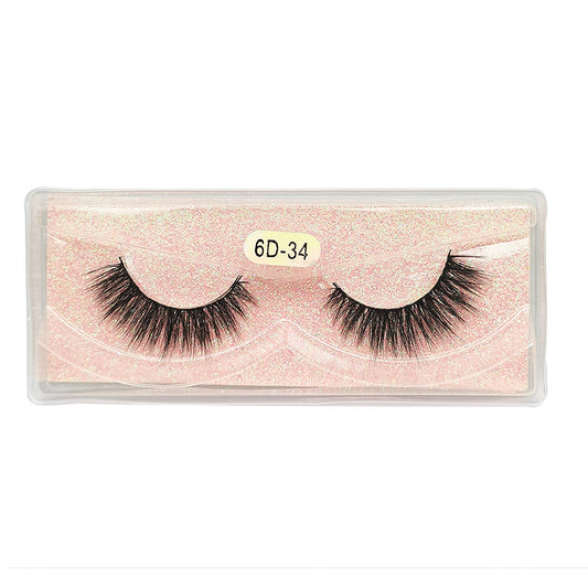 Thick false eyelashes with black stems